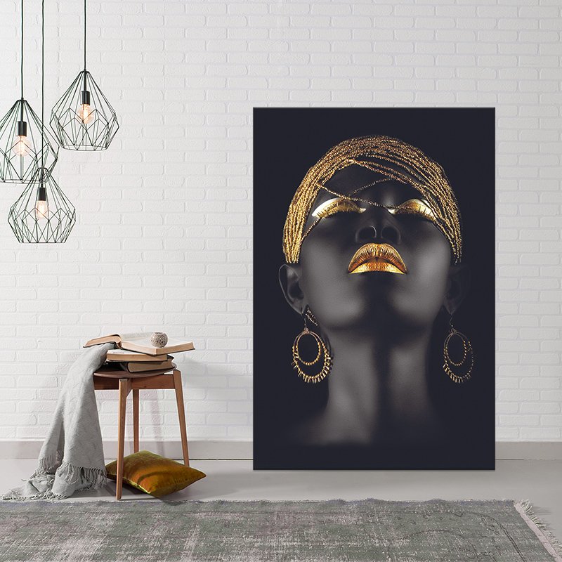 Black woman painting with gold lips Black woman painting with gold lips