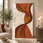 Terracotta Flow Wall Art displayed above a sofa in an elegant neutral-toned modern living room